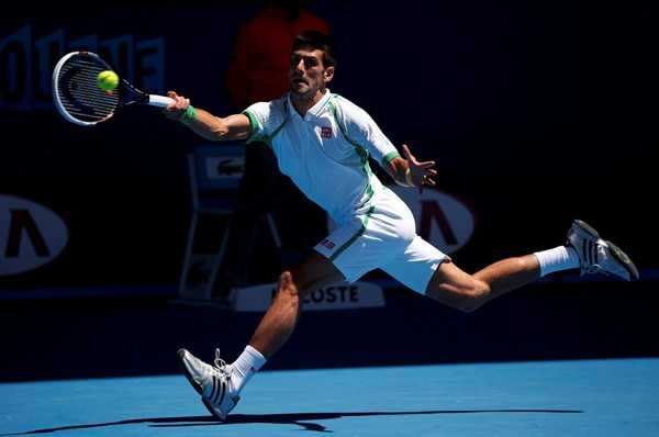 Novak Djokovic passa fácil pelo francês Mathieu na estreia da competição (Foto: Reuters)